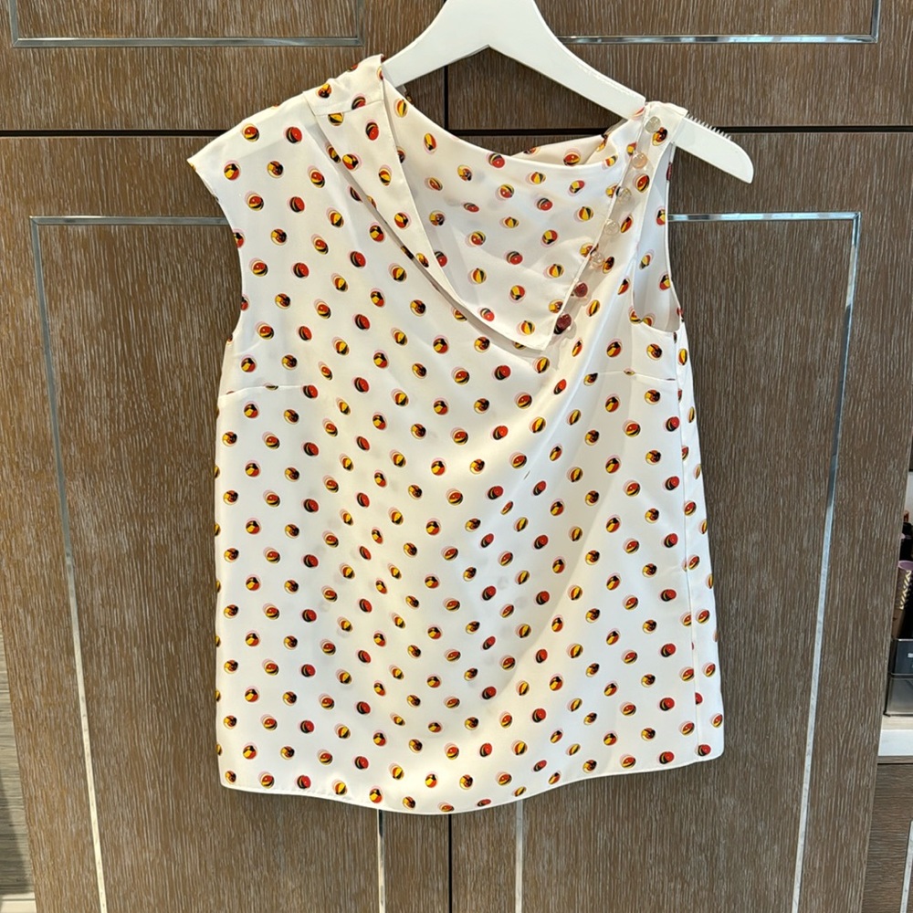 Hermes blouse with clear marble button top